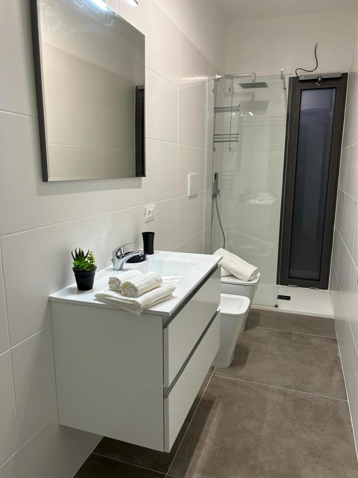 Family House Appartement Porto Torres Buitenkant foto