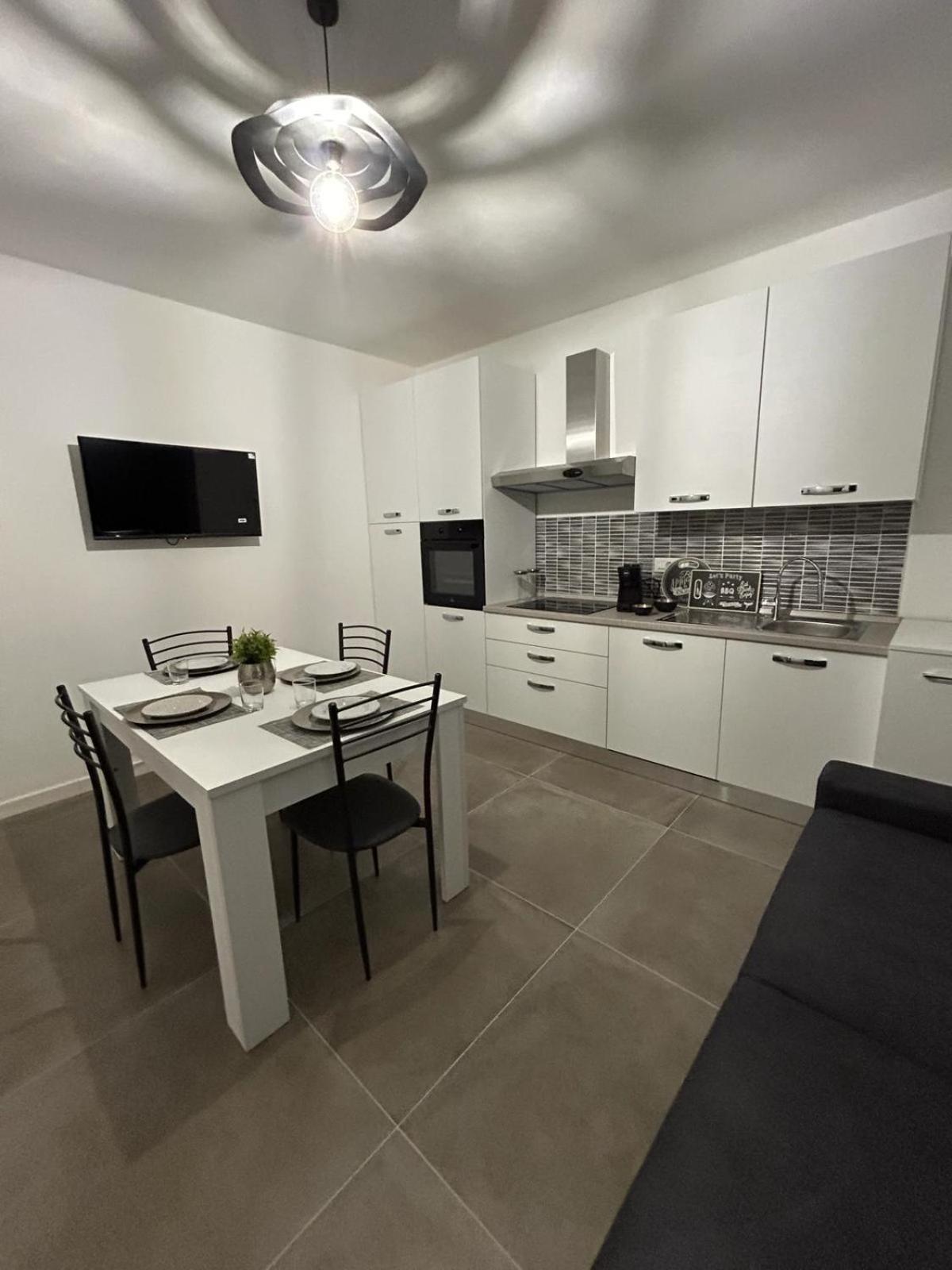 Family House Appartement Porto Torres Buitenkant foto